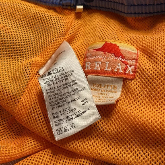 Tommy Bahama swimming trunks. Mesh under wear are orange on blue
A/28 - Picture 5 of 5